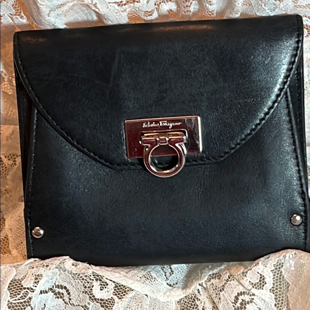 Salvatore Ferragamo’s small black wallet